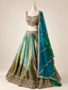 Studio edit of aqua and antique gold lehenga with embellished blouse and teal green dupatta