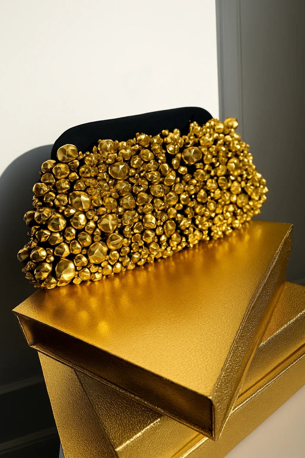 Blair black fabric statement clutch with gold stud embellishments