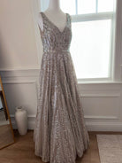 Original garment view of Seema Gujral champagne silver embellished gown